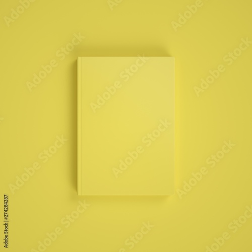 Blank yellow book on yellow background. Easy cover mockup. Front view.