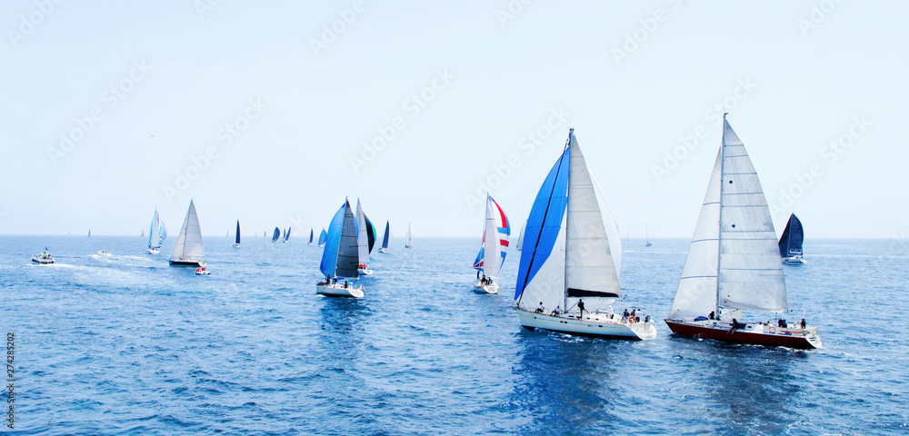 Obraz premium Brindisi, Italy - 06.16.2019: Sailing yachts during regatta Brindisi Corfu
