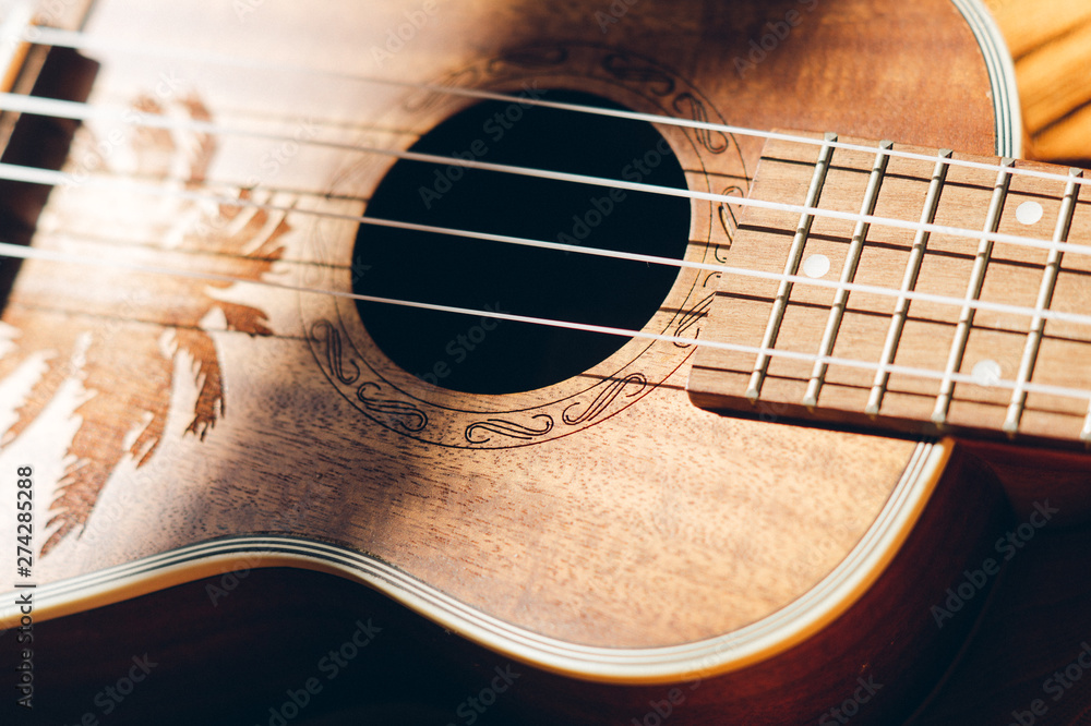 Obraz premium Ukulele closeup. Bright background.