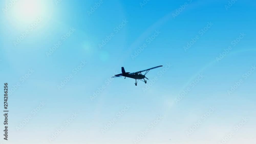 Small Sport Airplane - Aircraft Flying in The Sky, Ultralight Airplane Small Sport Airplane - Aircraft Flying in The Sky, Ultralight Airplane