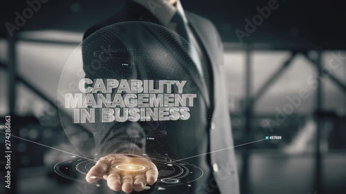 Capability Management in Business with hologram businessman concept photo