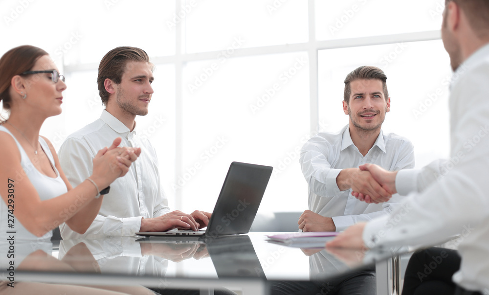 employees applaud the business partners at the negotiating table employees applaud the business partners at the negotiating table