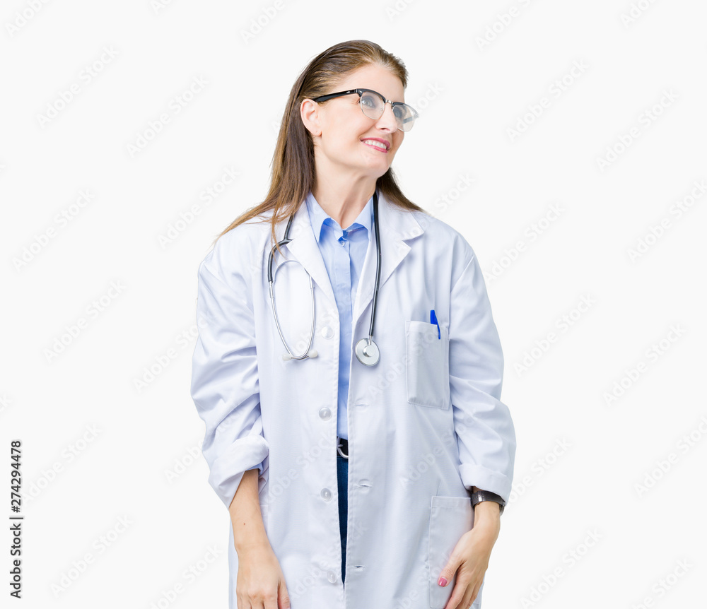Middle age mature doctor woman wearing medical coat over isolated background looking away to side with smile on face, natural expression. Laughing confident. Middle age mature doctor woman wearing medical coat over isolated background looking away to side with smile on face, natural expression. Laughing confident.
