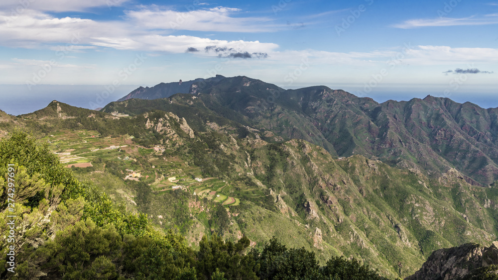 Green mountain range at the edge of the ocean Green mountain range at the edge of the ocean