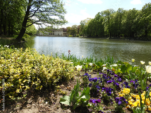 Palace on the lake in among flowers