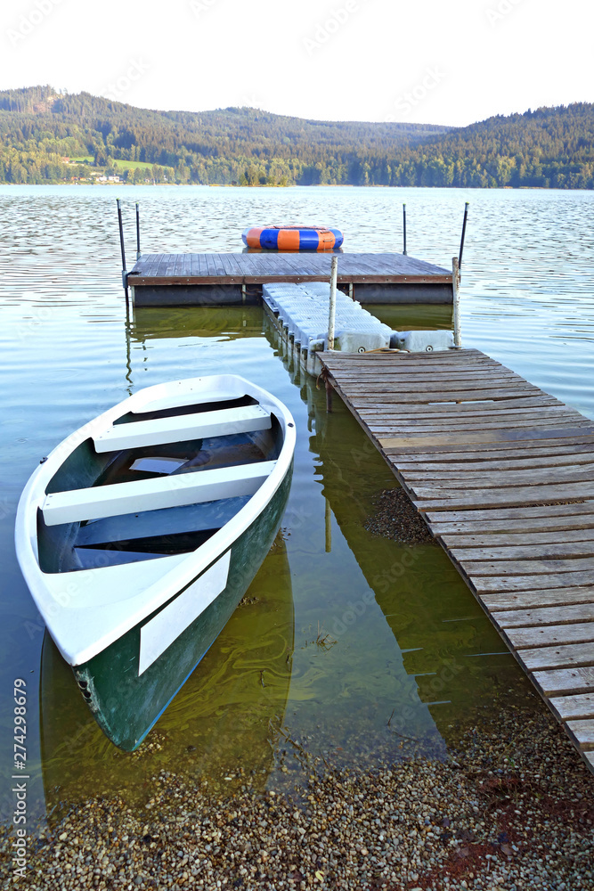 Small Dock and Boat, at Lipno lake.