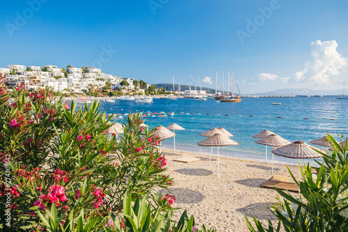 Fototapeta Naklejka Na Ścianę i Meble -  View of Bodrum Beach, Aegean sea, traditional white houses, marina, sailing boats, yachts in Bodrum town Turkey. 
