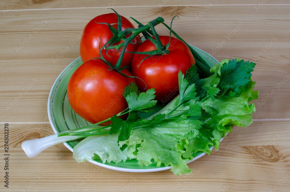 tomatoes on a bowl with lettuce tomatoes on a bowl with lettuce