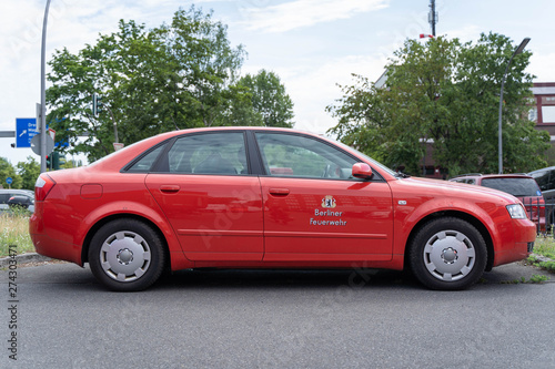 German firefighter car on a deployment site. The german word  Feuerwehr  means fire fighters