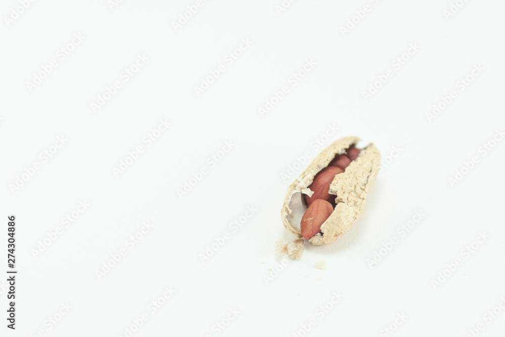 Color photo of peanuts on an isolated white background with room for copy. Color photo of peanuts on an isolated white background with room for copy.