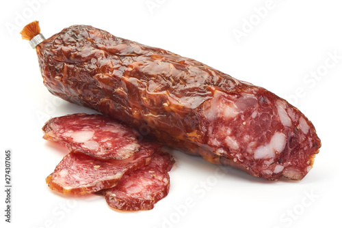 Dried pork sausage, traditional smoked meat, close-up, isolated on white background