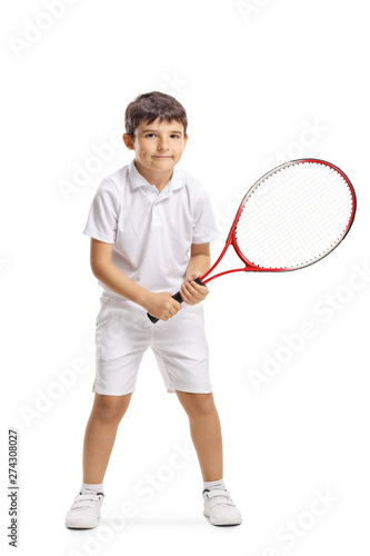 Child tennins player posing with a racquet