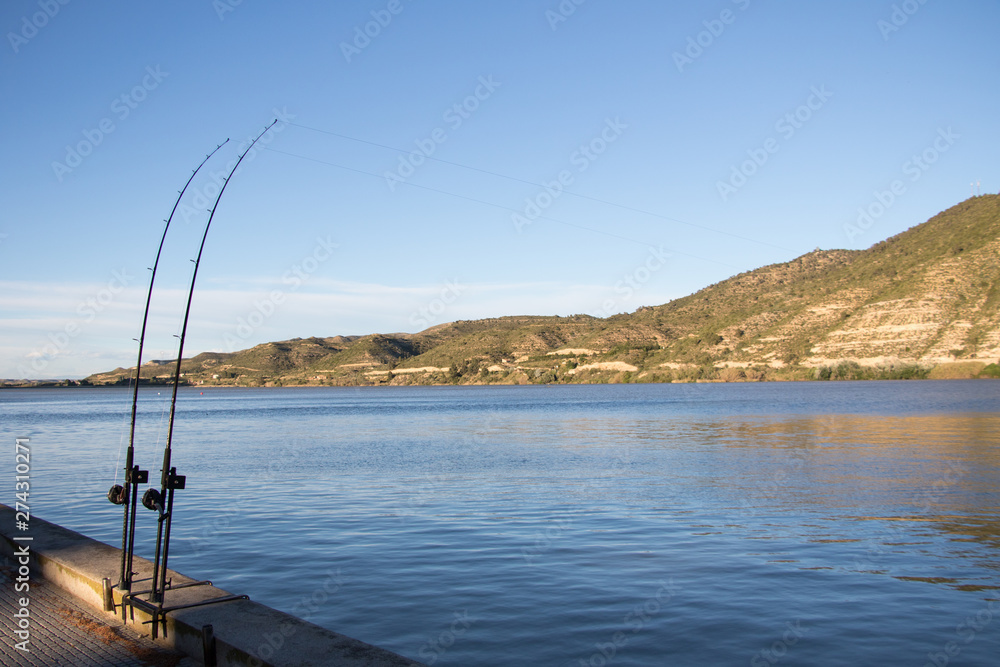 Fishing rods by the river Ebro