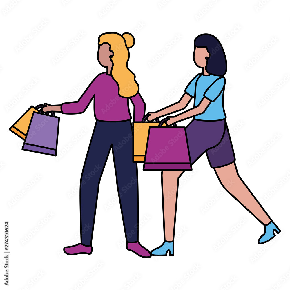 two women holding shopping bags