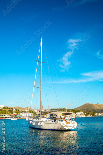 View of the Gumusluk, Bodrum Marina, sailing boats and yachts in Bodrum town, city of Turkey. Shore and coast of Aegean Sea with yachts and boats © Hakan Tanak