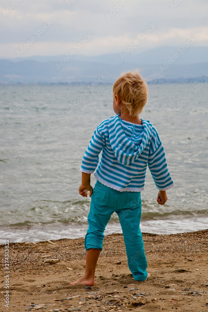 little boy on the beach little boy on the beach