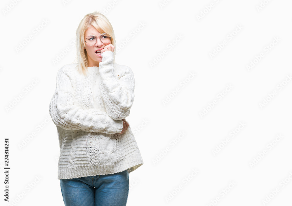 Young beautiful blonde woman wearing winter sweater and glasses over isolated background looking stressed and nervous with hands on mouth biting nails. Anxiety problem. Young beautiful blonde woman wearing winter sweater and glasses over isolated background looking stressed and nervous with hands on mouth biting nails. Anxiety problem.