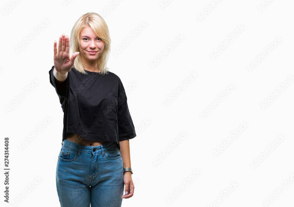 Young beautiful blonde woman over isolated background doing stop sing with palm of the hand. Warning expression with negative and serious gesture on the face. Young beautiful blonde woman over isolated background doing stop sing with palm of the hand. Warning expression with negative and serious gesture on the face.
