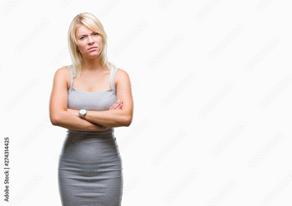 Young beautiful blonde woman over isolated background skeptic and nervous, disapproving expression on face with crossed arms. Negative person. Young beautiful blonde woman over isolated background skeptic and nervous, disapproving expression on face with crossed arms. Negative person.