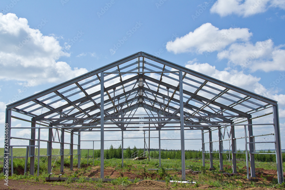 The structure of the building. Steel construction on the sky background. Electroplate steel metal. Zinc metal coating to protect against corrosion.