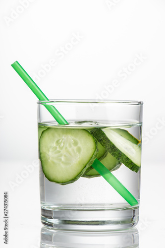 Cucumber water, cleansing water to detoxify the body and quench thirst on a white background.