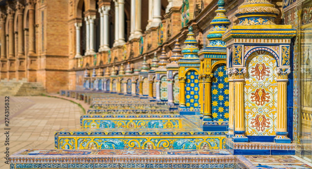 Fototapeta premium Tiles and decorations in the beautiful Plaza de Espana in Seville. Andalusia, Spain.