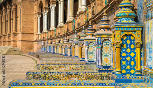 Tiles and decorations in the beautiful Plaza de Espana in Seville. Andalusia, Spain.
