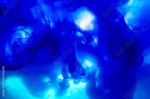 Abstract blue paint splash. blue color paint pouring in water