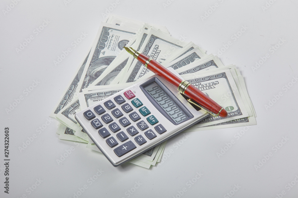 Fototapeta premium Calculator on money banknote, finance and savings.