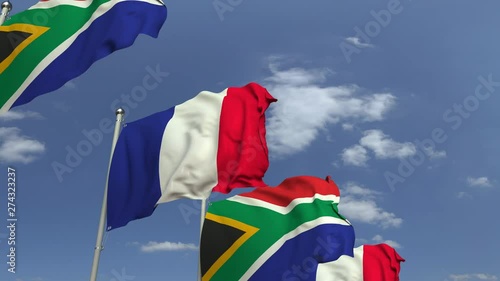 Row of waving flags of South Africa and France, loopable 3D animation photo