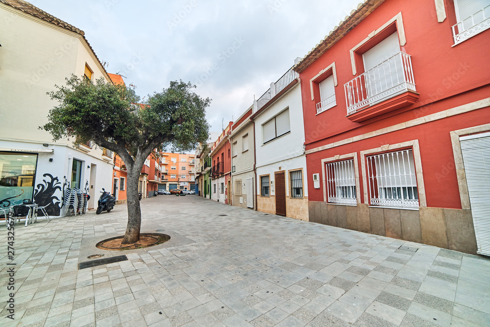 DENIA, SPAIN - JUNE 13, 2019: Old town of Denia with beautiful square