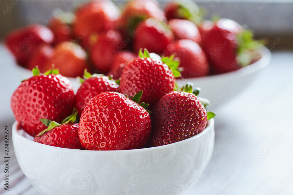 Strawberries in a white bowl Strawberries in a white bowl