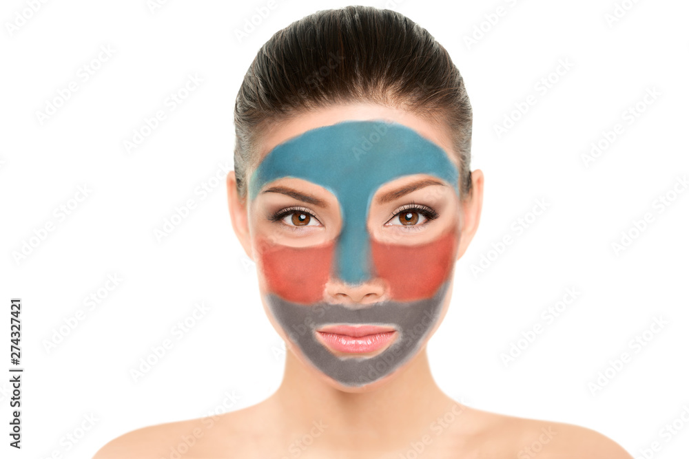 Face mask Asian beauty woman multimasking with different color clay latest trend in dermatology. Fun facial therapy for different skin zones.