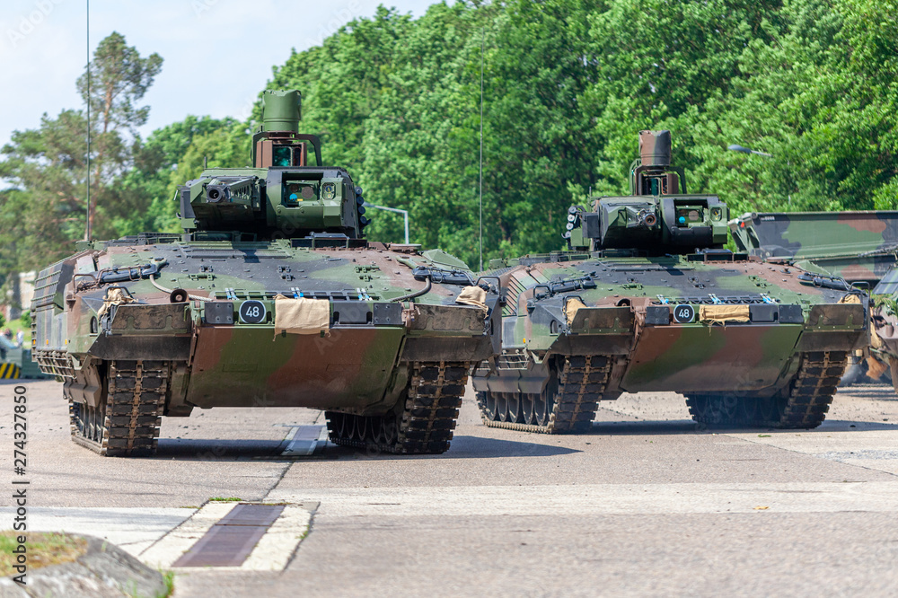 German infantry fighting vehicle drives on a street German infantry fighting vehicle drives on a street