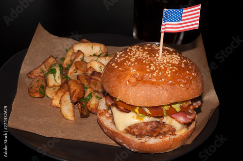 The original American Burger and french fries. 4th of july
