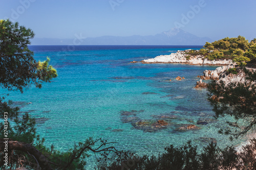 Fototapeta Naklejka Na Ścianę i Meble -  Beautiful blue Ionian sea from the top of the hill in Sithonia, Greece.