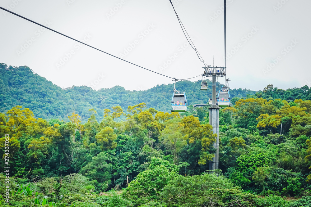 Maokong gondola with mountain around. A gondola lift transportation system in Taipei opened in 2007. operates between Taipei Zoo and Maokong.