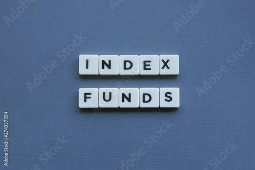 ' Index Funds ' word made of square letter word on grey background.