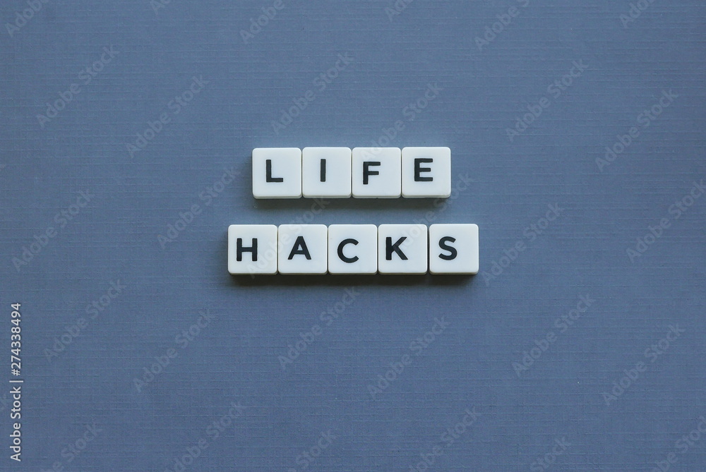 ' Life Hacks ' word made of square letter word on grey background. ' Life Hacks ' word made of square letter word on grey background.