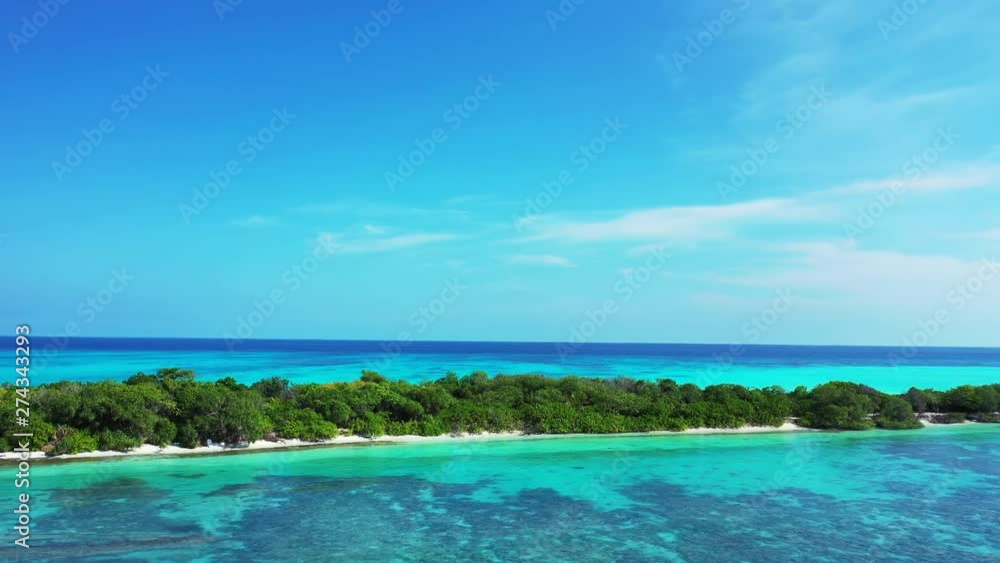 aerial drone pedestal down shot majestic view of crystal clear turquoise water with corals, Philippine sea with uninhabited island aerial drone pedestal down shot majestic view of crystal clear turquoise water with corals, Philippine sea with uninhabited island