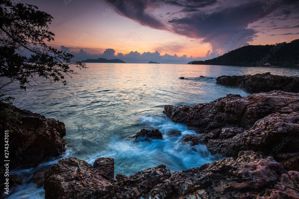 Colorful sunset on the sea in Koh Wai island, Trat  province, Thailand.