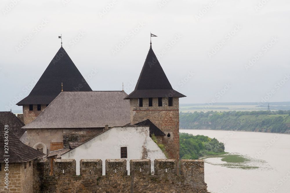 Old fortress by the river in Khotyn, Ukraine Old fortress by the river in Khotyn, Ukraine