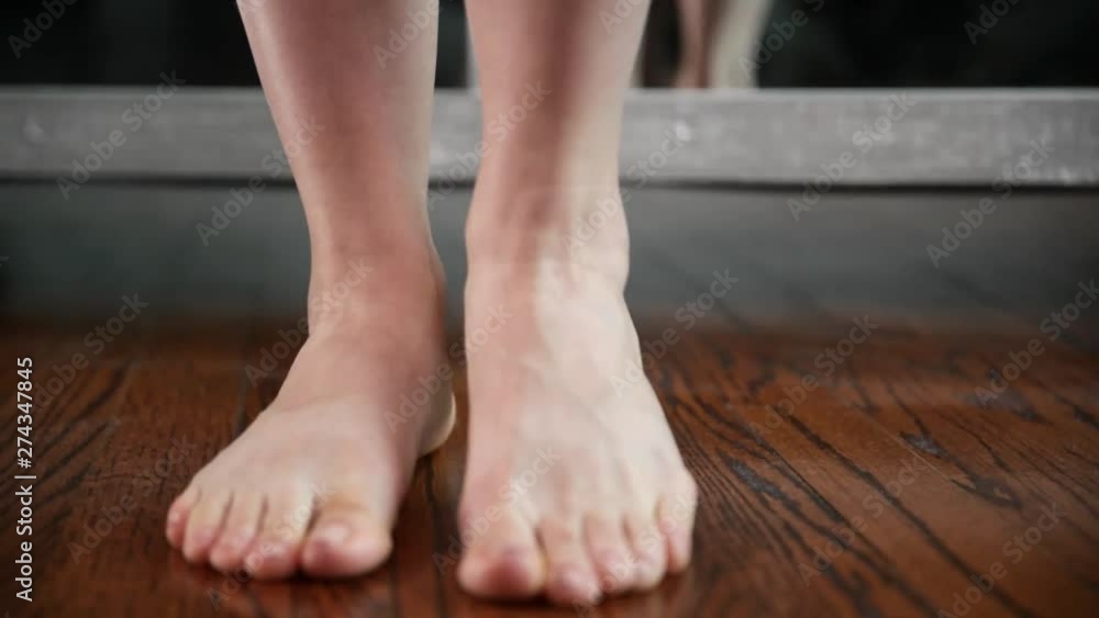 Woman shows her feet, legs and ankles after peeling Woman shows her feet, legs and ankles after peeling