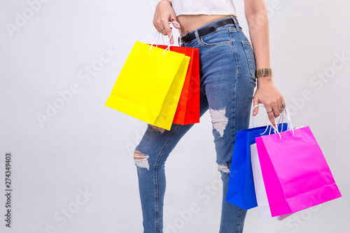 young women with shopping on white background
