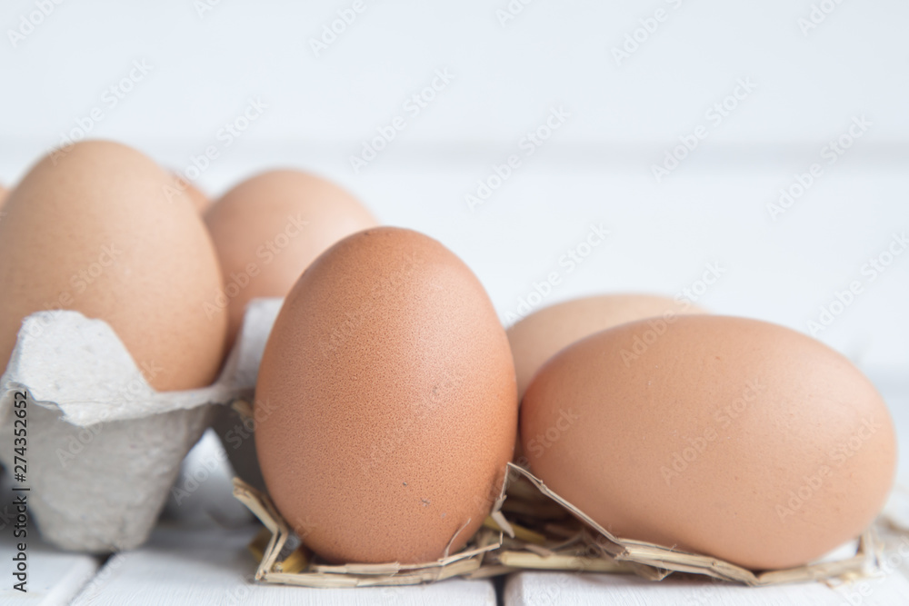 Eggs chicken on white wood background Eggs chicken on white wood background