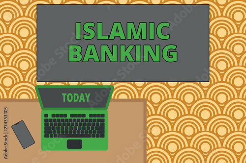 Writing note showing Islamic Banking. Business concept for Banking system based on the principles of Islamic law Office working place laptop lying wooden desk smartphone photo