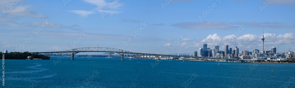 Panoramic view of the Auckland Harbour Bridge, with Auckland City as background