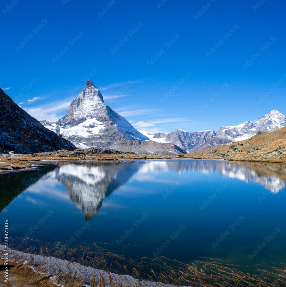 Naklejka premium Reflection of Riffelsee and Matterhorn mountain in Switzerland