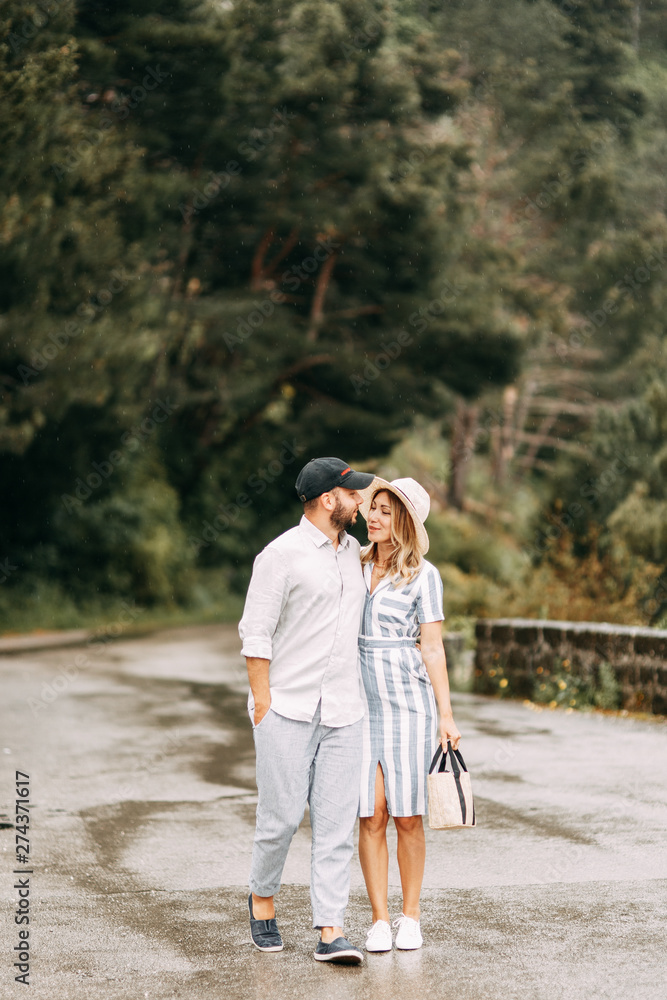 Summer photo shoot at sunset in the Bay of Kotor. Wedding love story with a beautiful couple. Summer photo shoot at sunset in the Bay of Kotor. Wedding love story with a beautiful couple.