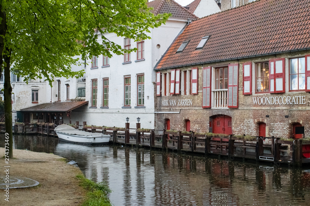 Fototapeta premium Brugge streets and Architecture with canals and historical buildings. Popular touristic destination of Belgium. Brugge, Belgium